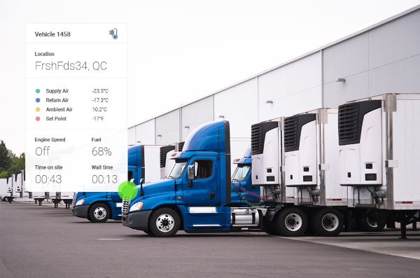 Reefer trucks at a warehouse 