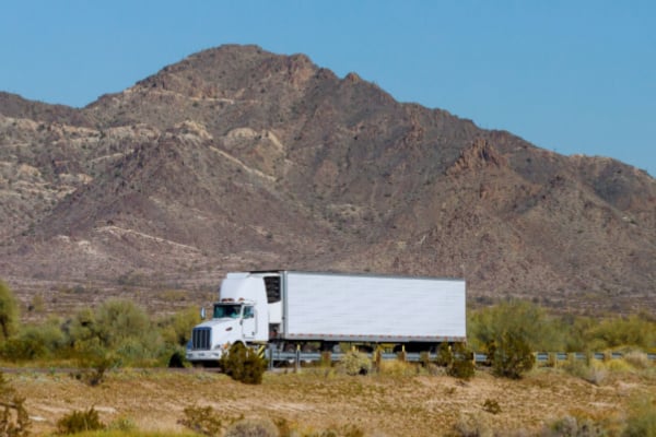 reefer truck driving through mountains