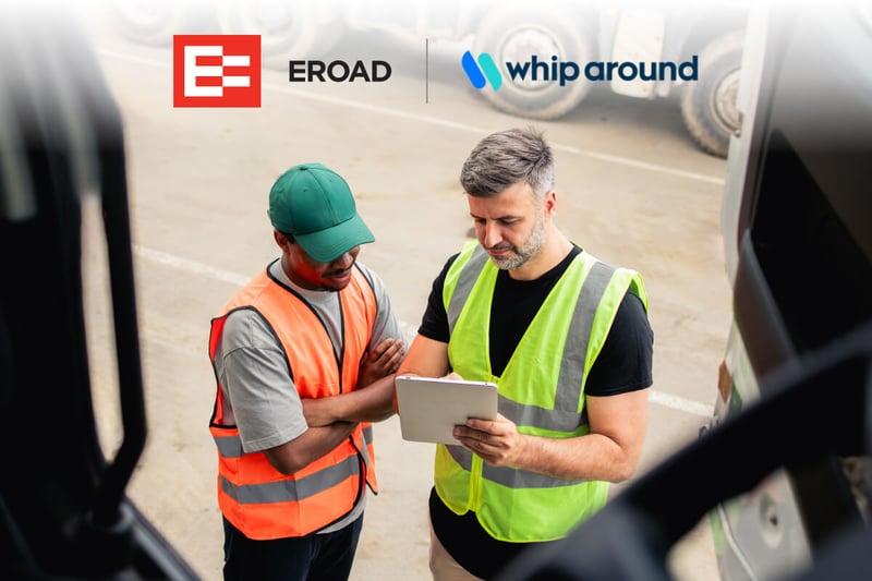 Two fleet maintenance workers in safety vests look at a tablet together. The EROAD logo and the Whip Around logos appear on the image. 