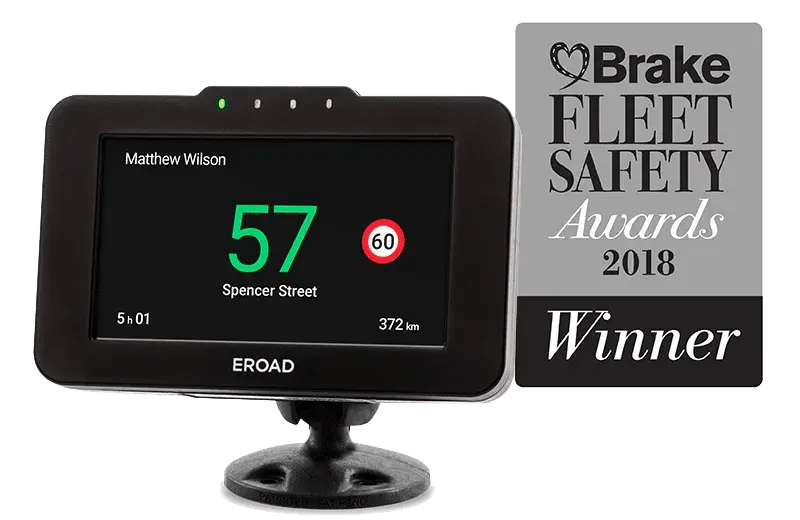 EROAD in-cab device showing 57 in a 60 zone on Spencer Street, beside a Brake Fleet Safety Awards 2018 Winner badge