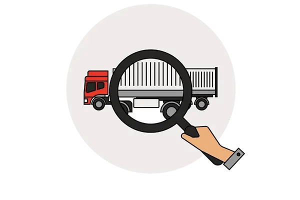 Illustration of a hand holding a magnifying glass over a red truck