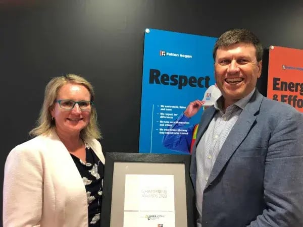 Dr Bryan Pidwerbesky of Fulton Hogan and another person holding a Champions Awards 2020 certificate