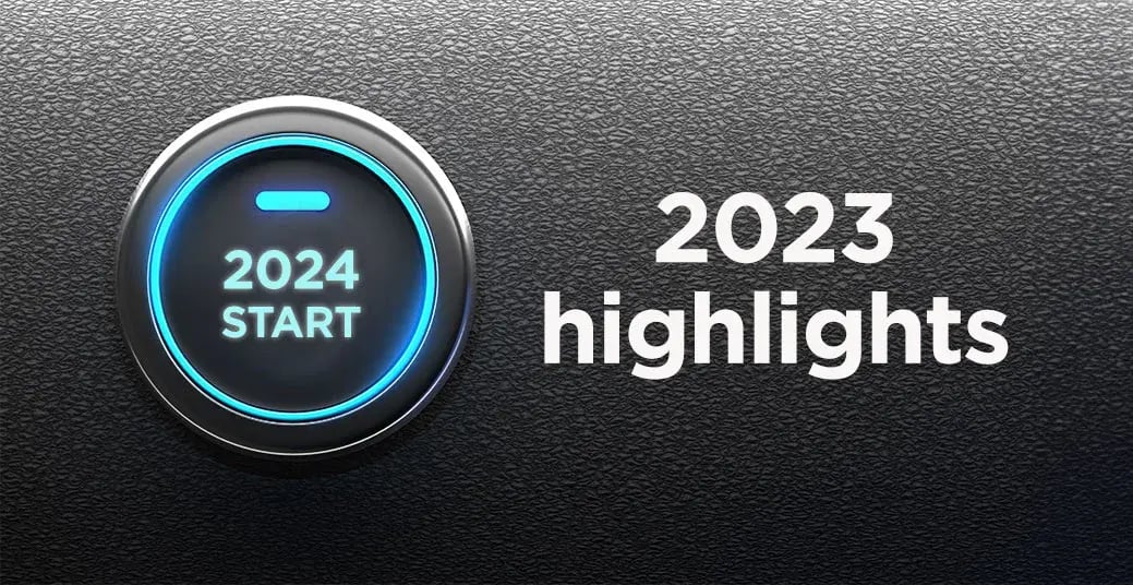 Glowing push start button reading 2024 start, beside the words 2023 highlights