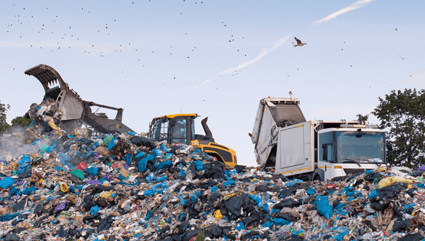 A waste truck on its route