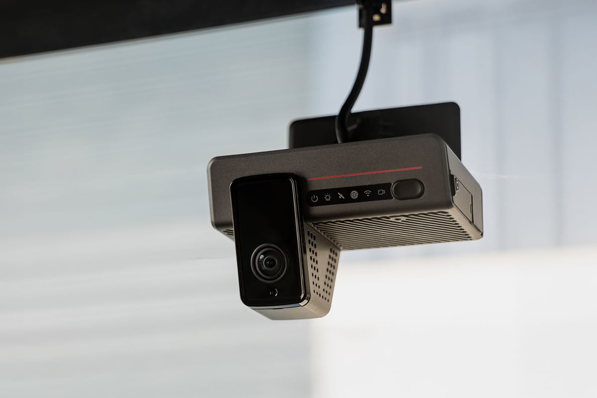 The EROAD Clarity Edge dual-facing dash camera, mounted in a vehicle cab
