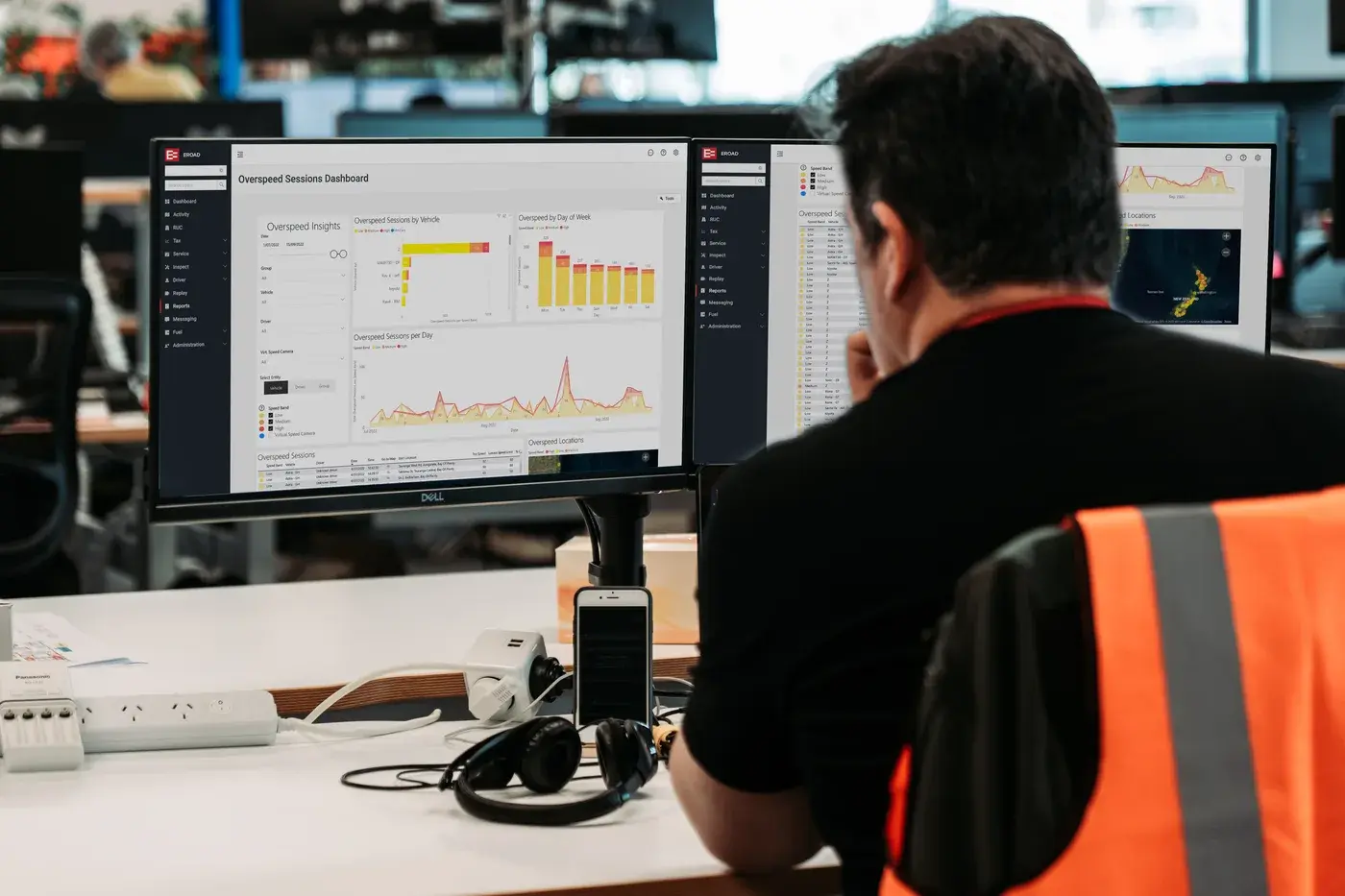 A fleet manager reviewing the MyEROAD overspeed dashboard on a desktop monitor