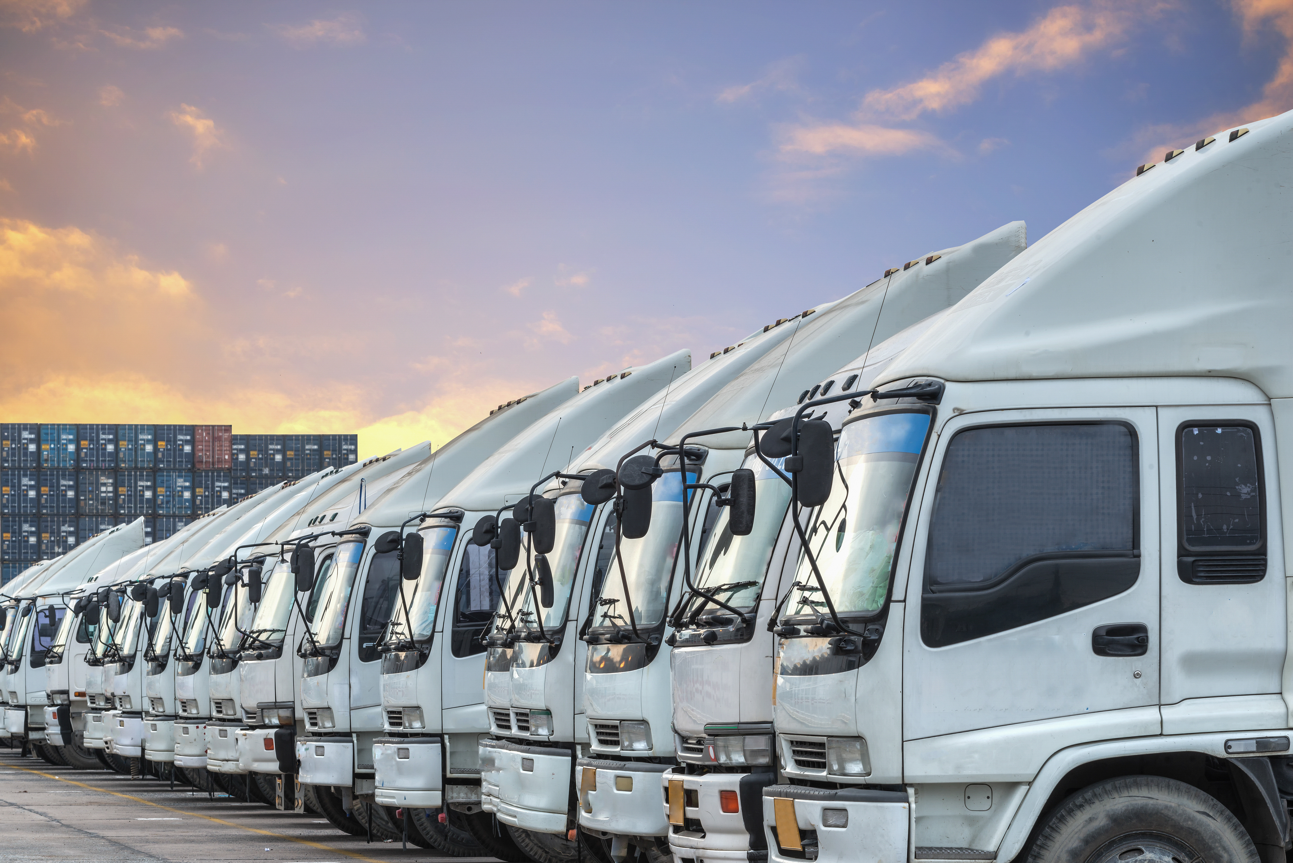 stock photo trucks lined up in yard
