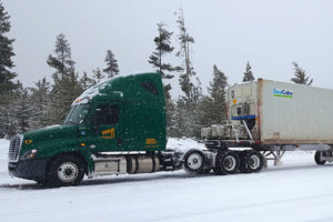 Phase II Transportation truck on snowy road