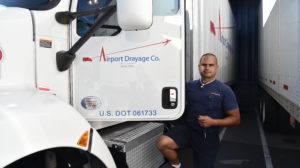 Airport Drayage driver getting into company truck